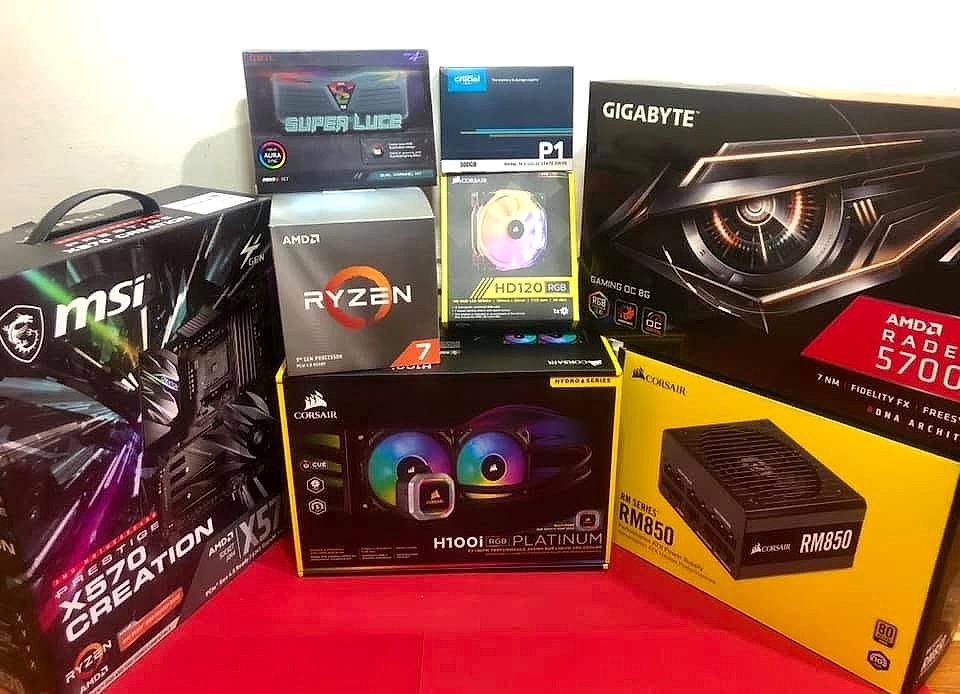 PC parts ready for a custom build at the Computer Servicing office: AMD Ryzen 7, Gigabyte graphics card, Corsair power supply and cooling